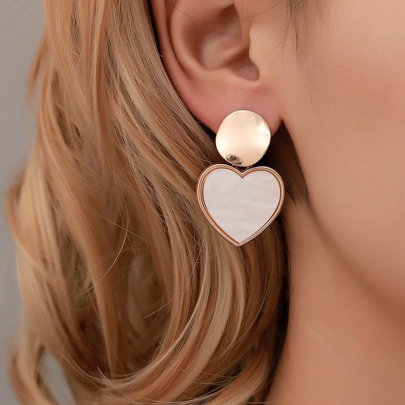 Korean version of small fresh earrings simple geometric heart earrings personality hollow disc alloy pendant girl heart earrings