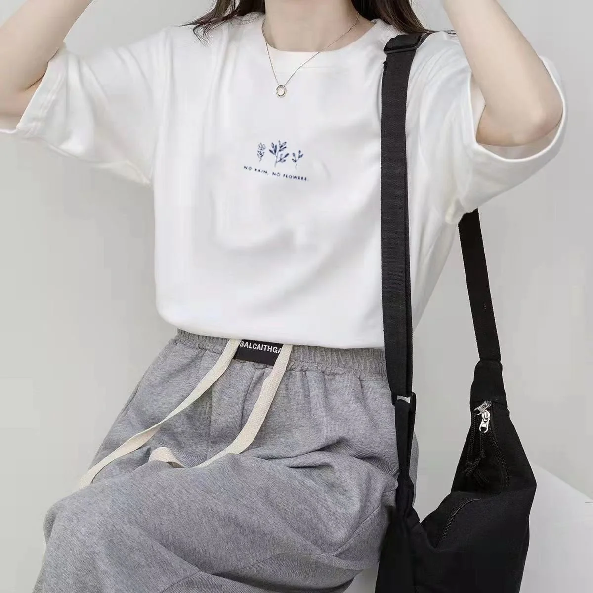 Short-sleeved Korean round neck T-shirt for women in summer with loose plant print casual solid color fire student half-sleeved top - Image 11