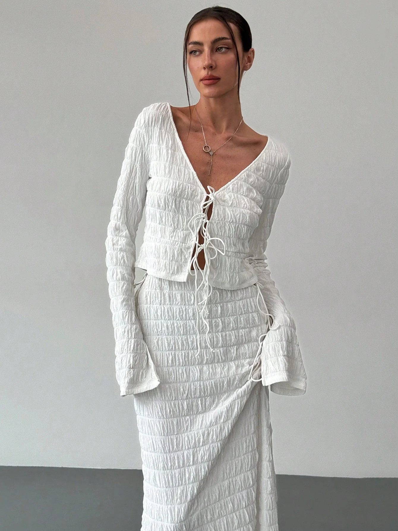 Women's Elegant And Chic V Neck Tie Front Crop Top And Low Rise Low Waist Textured Skirt Two Piece Set Long Sleeve Shirt With Skirt Sets Women Skirt Set Fall Women Skirts Casual Two Piece SetFall Two Piece Sets - Image 3